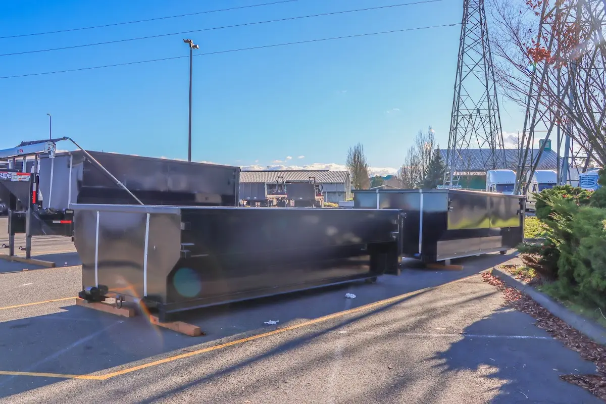 Roll-off dumpster ready for waste disposal at job site for Demolition Dumpster Rental in Berryville